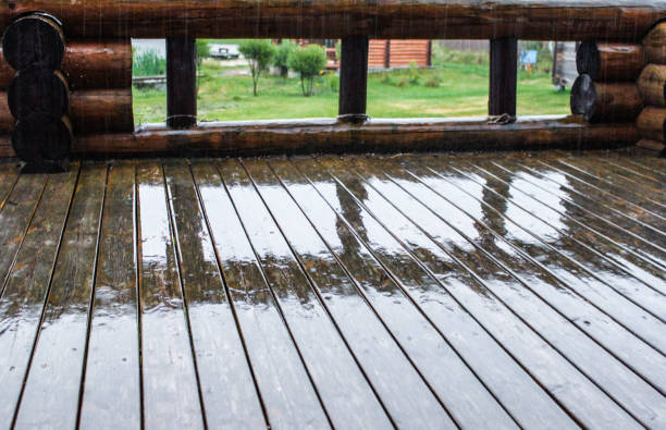 istock Wooden terrace in the rain 1250427023