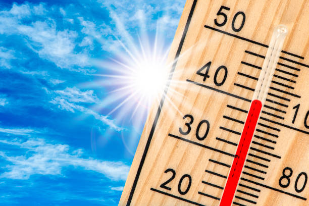 istock thermometer with high temperature, sunbeam and clear sky 1250428392