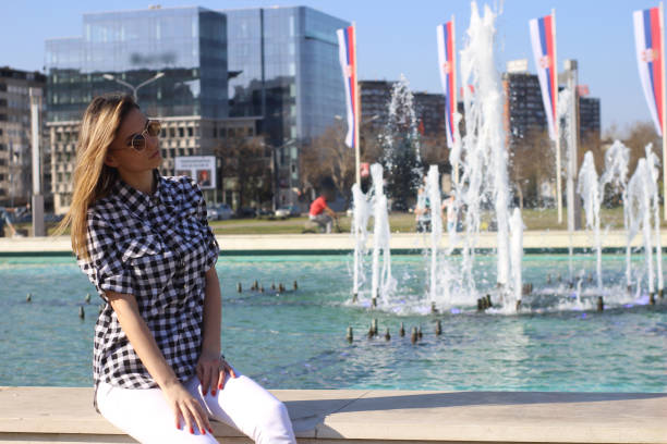 istock Young woman pose in city 1250430975