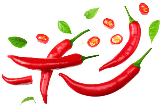 istock sliced red hot chili peppers isolated on white background top view 1250440545