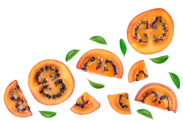 istock Fresh tamarillo fruit slices with leaves isolated on white background. Top view. Flat lay. Set or collection 1250440628