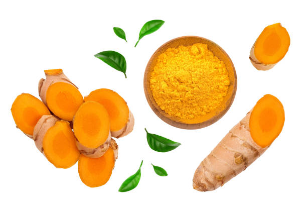 istock turmeric root slices isolated on white background. Top view. Flat lay 1250443458