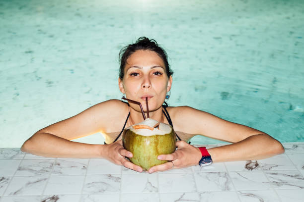 young brunette cheerful woman on vacation - beauty spa flash imagens e fotografias de stock