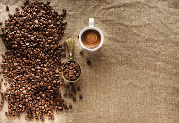 istock Cup coffee and beans coffee on burlap background, flat lay 1250447210