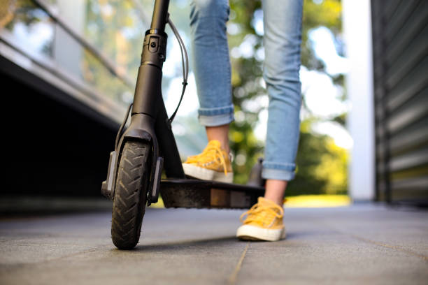 istock Driving an electric scooter 1250448434