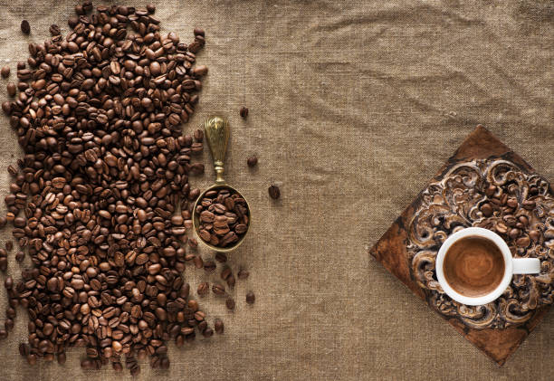 istock Cup coffee and beans coffee on burlap background, flat lay 1250450025