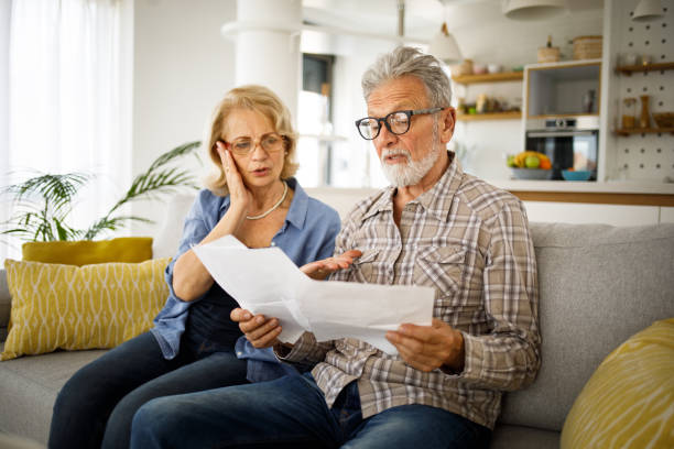 istock Senior couple having problems with home finances 1250450492