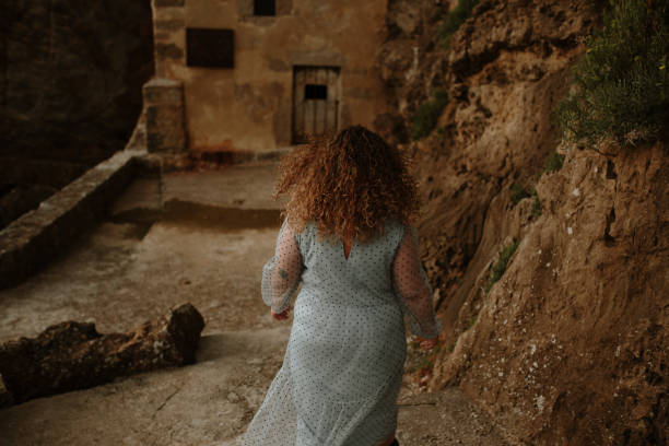 istock Rear view of a young woman 1250451472