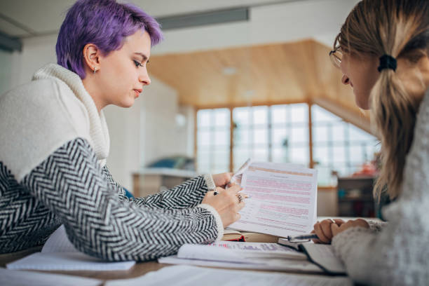 istock Two young women studying together 1250454354