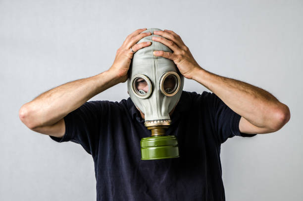 istock Man with gas mask 1250455218