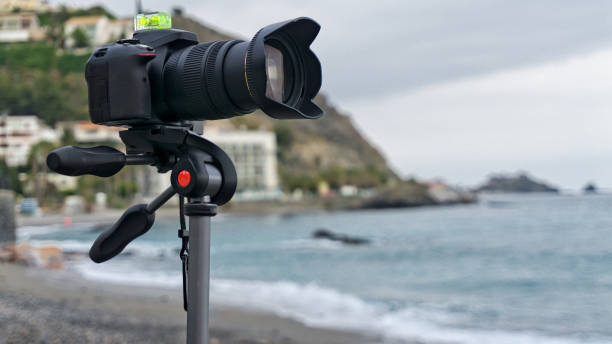 istock Reflex camera taking pictures over a beautiful landscape 1250457765