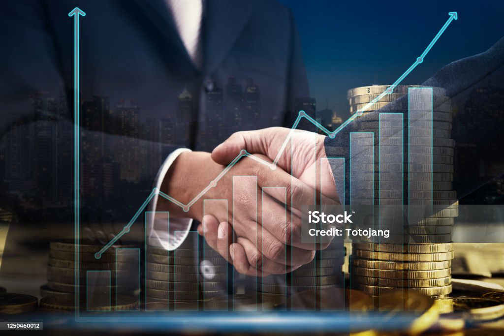 Business handshake for success deal with growth step coin and info graph, business partnership and investment concept, Financial Occupation Stock Photo