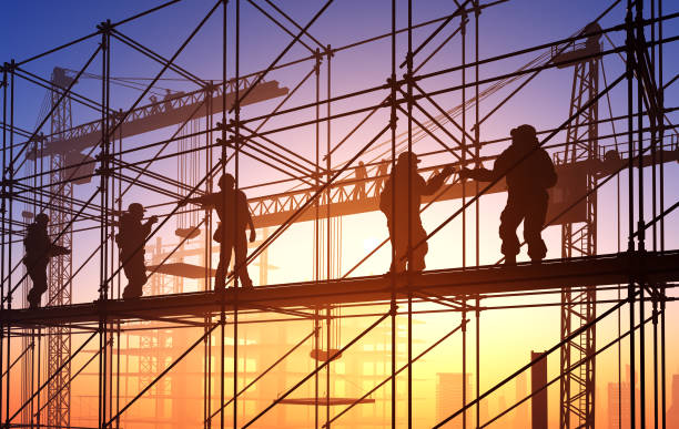 istock Silhouette of the workers 1250462944
