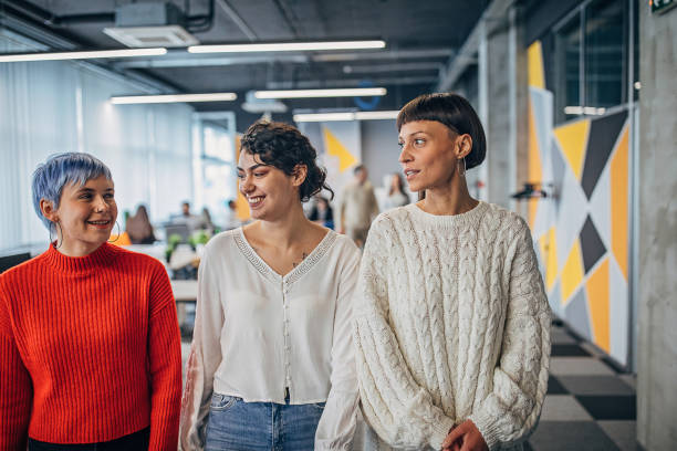 istock Beautiful women in big modern office 1250464111