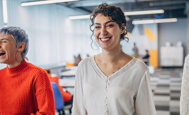 istock Beautiful women in big modern office 1250464695