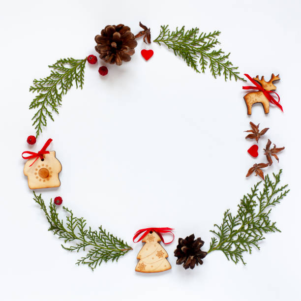 istock Christmas round frame made of fir tree branches and decorations 1250467022