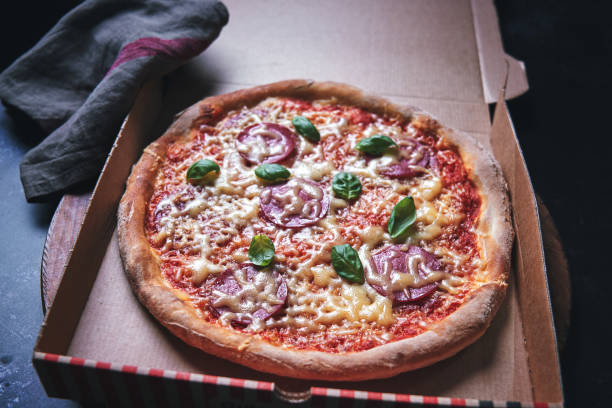 istock Pizza with Salami in a Take Away Box 1250470812