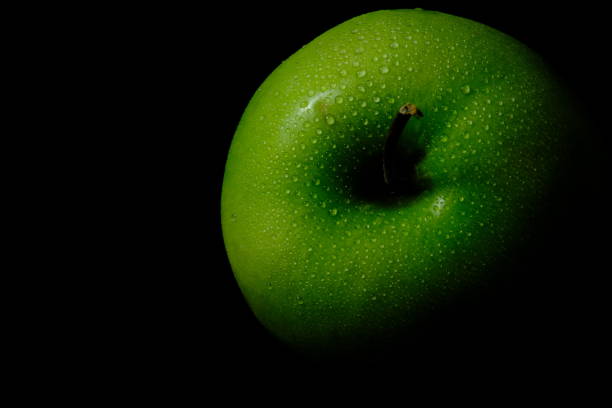istock Close up fresh green Apple with water 1250470942