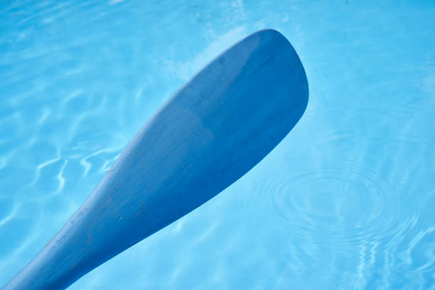 istock blue paddle blade in the water 1250478409