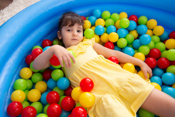 istock Little girl playing 1250478460