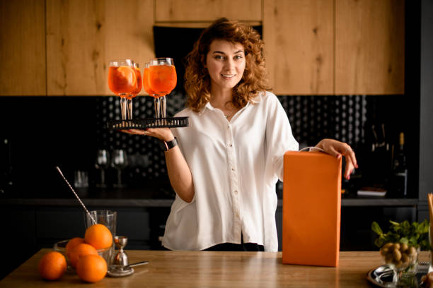young woman holds in her hand tray with glasses of cold drinks. - drink on top of ice food imagens e fotografias de stock