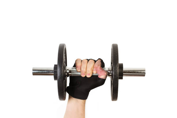 istock Man with a sport glove holding a dumbbell 1250482469