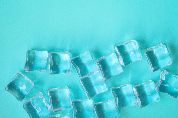 istock ice cubes artificial transparent square acrylic pieces food background top view copy space for text 1250482503