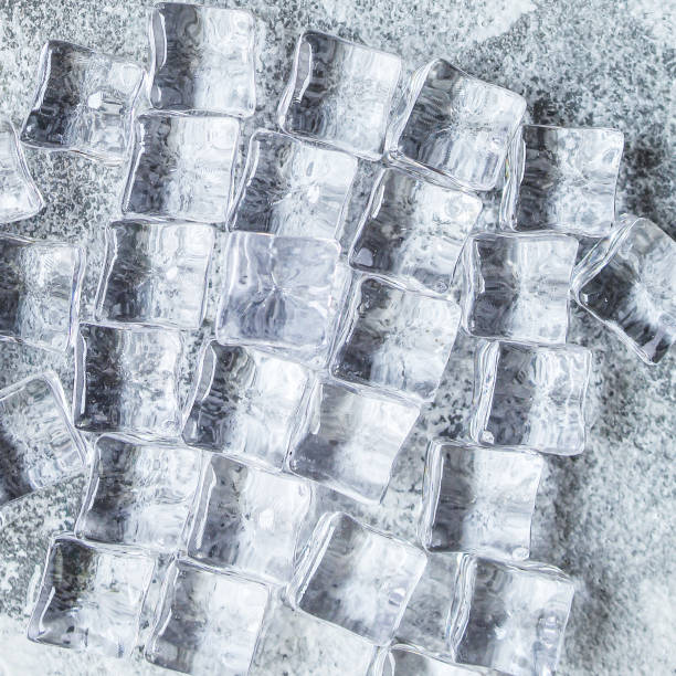 istock ice cubes artificial transparent square acrylic pieces food background top view copy space for text 1250482507
