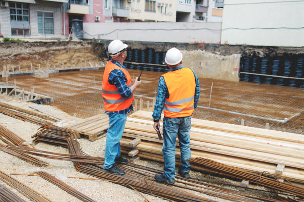 istock Managers, engineers discuss the further process of work on the construction site 1250483840