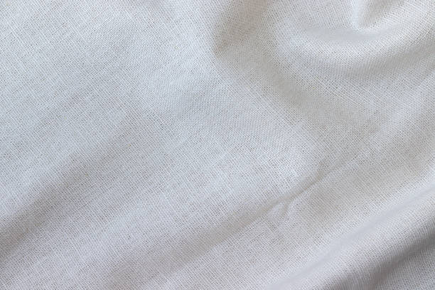 istock Soft natural linen texture. Crumpled fabric background. Selective focus. Closeup view 1250484018
