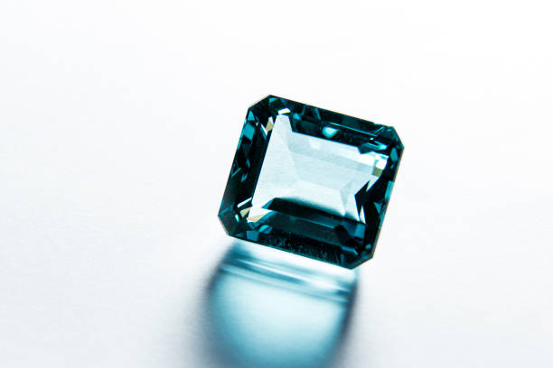 close macro on faceted gem of blue topaz