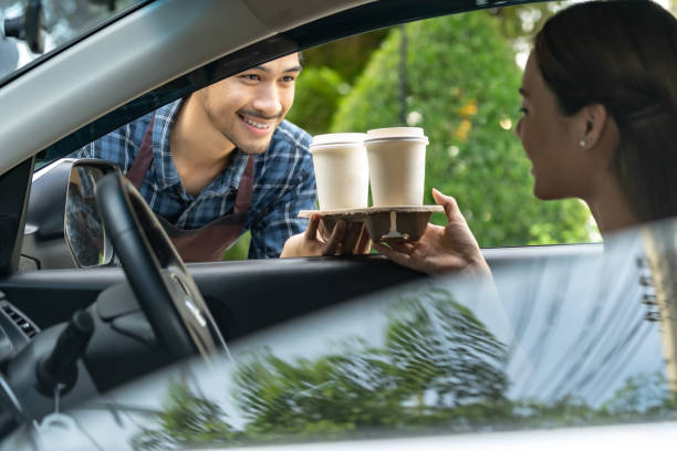 istock Waiter deliver food with drive thru service 1250488311