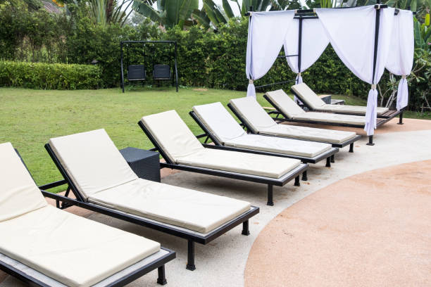 istock Tranquil view of the white sunbed row. 1250489504