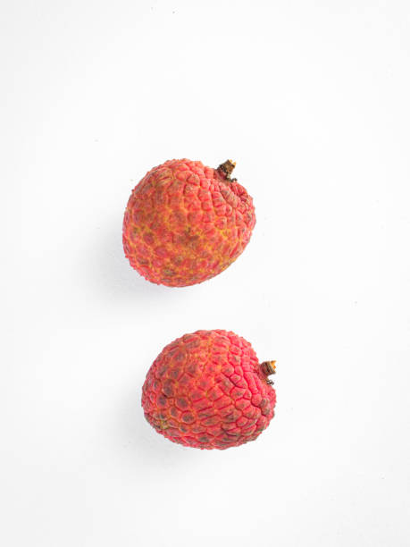 istock fresh litchi isolated stock images. 1250490278