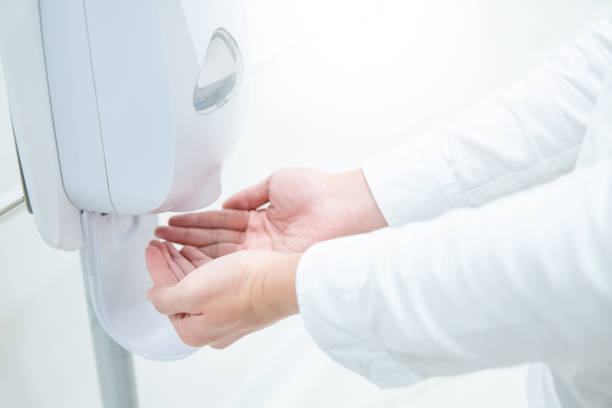 istock Automatic alcohol dispenser in hospital 1250490296