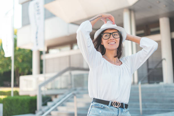 istock Hipster girl or female smiling, blurred background 1250492064