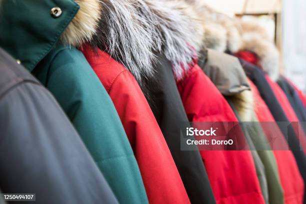 Assortment Of Winter Jackets And Down Jackets Stock Photo - Download Image Now - Coat - Garment, Warm Clothing, Winter