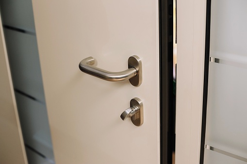 Block striped room door and black door handle