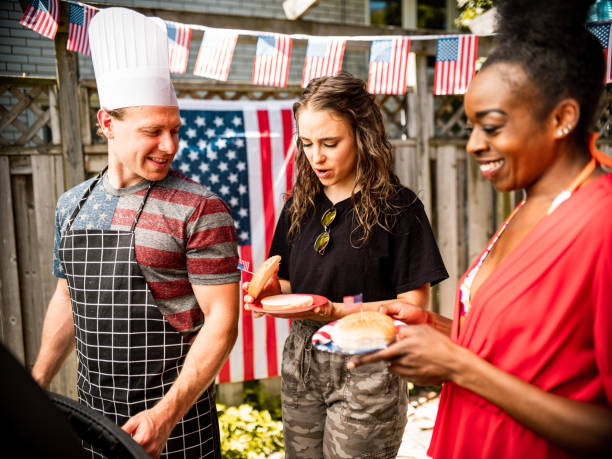 istock Burger line up at 4th July BBQ 1250499332
