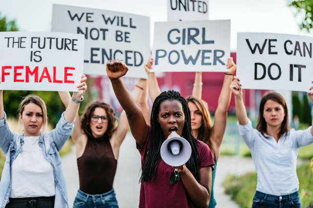 istock Women protesting for equality and women rights 1250504472