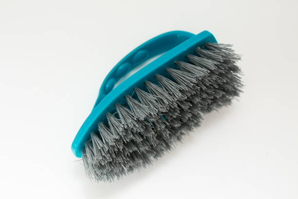 plastic cleaning brush on white background
