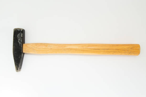 istock hammer with wooden handle on a white background 1250508481
