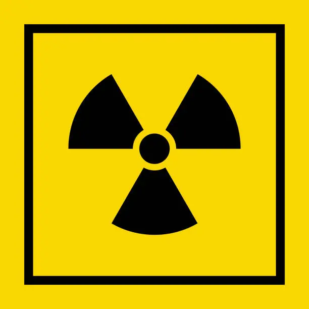 Vector illustration of Radiation Hazard Sign. Symbol of radioactive threat alert in a black frame on yellow background.