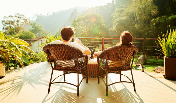 istock Couple relaxing in hotel balcony 1250509788