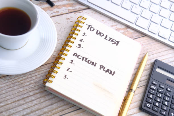 istock To do list in notebook with office suppliers on desk 1250510042