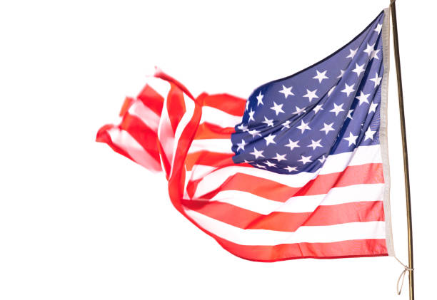 istock USA flag flying in the wind isolated on white background 1250510137