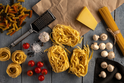 Different shapes and looks of Italian raw pasta