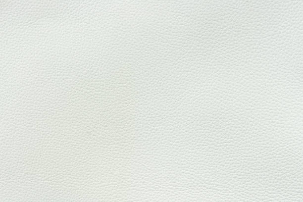 istock Texture background from white leather of medium grain. seamless 1250515509