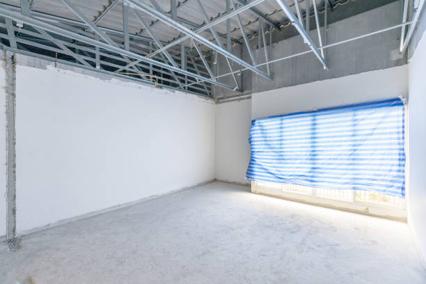 istock Construction site of empty Interior space, unfinished building after demolition process. Home improvement and renovation business. 1250516488