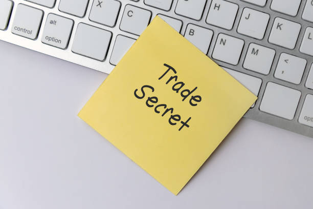 istock Trade Secret text on paper note stick 1250516879